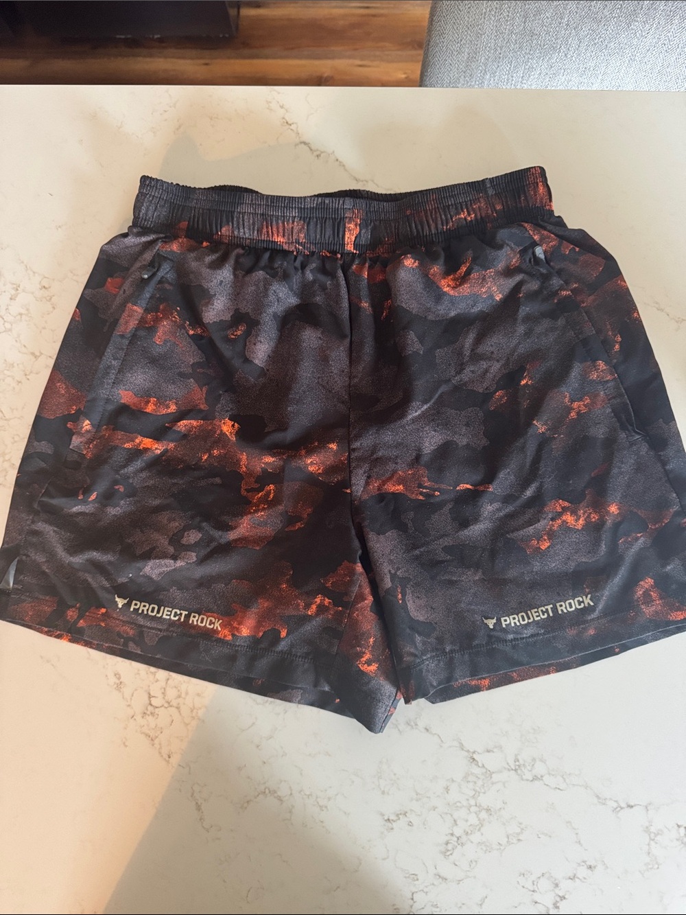 Under Armour Project Rock Black and Orange Athletic Shorts